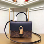 Women Lock Top luxury handbag